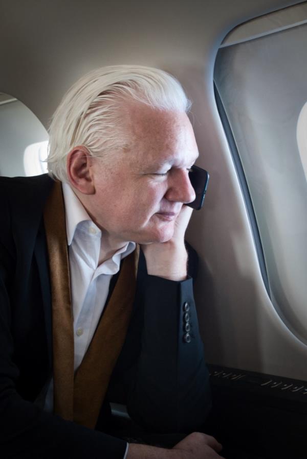 WikiLeaks founder Julian Assange returned to his homeland Australia aboard a charter jet on Wednesday, hours after pleading guilty to obtaining and publishing US military secrets.