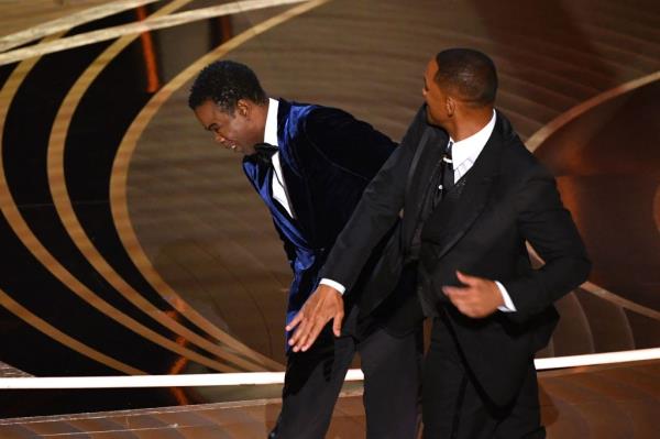 Will Smith slapping Chris Rock at the  2022 Oscars