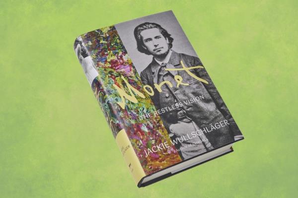 Panoramic view of a green abstract grunge texture with a book depicting Leo<em></em>nid Andreyev