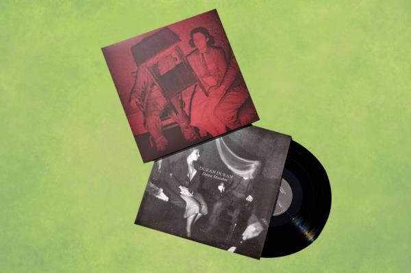 A record case and cover featuring Anto<em></em>nia Pozzi on a green abstract grunge texture panoramic background.