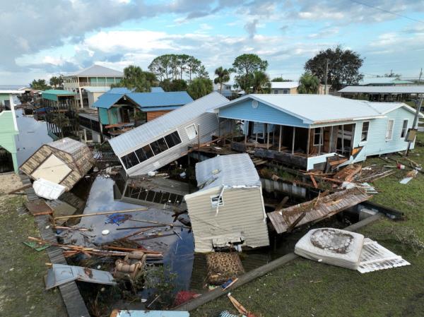 Damaged houses from Hurricane Idalia in Horseshoe Beach, Florida.