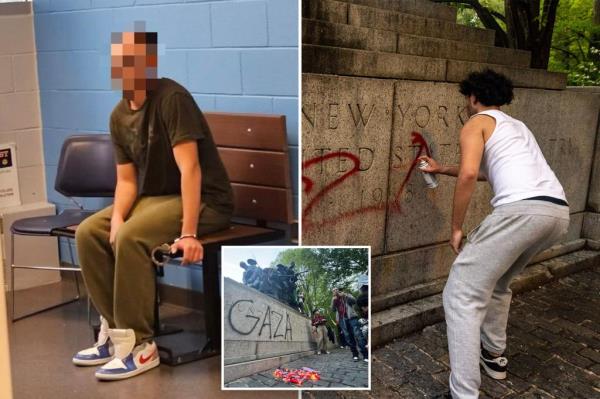 The war memorial was defaced by several vandals who scrawled 