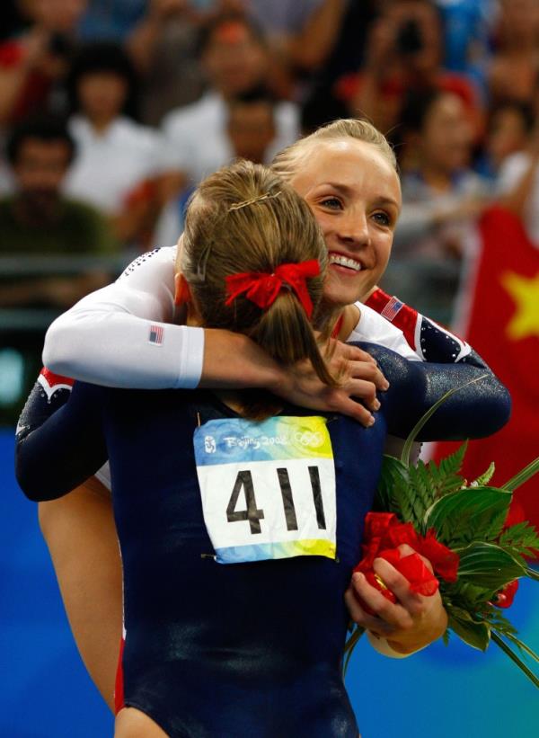 Gold medalist Shawn Johnson and silver medalist Nastia Liukin co<em></em>ngratulate each other during the medal ceremony for the Women's Beam Final at at the Beijing 2008 Olympic Games.