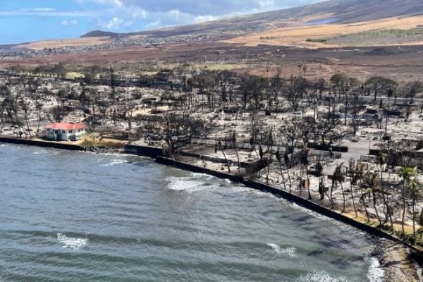 This photo provided by the Hawaii Department of Land and Natural Resources shows burnt areas in Lahaina on the Maui island, Hawaii, Friday, Aug. 11, 2023, following a wildfire. (Hawaii Department of Land and Natural Resources via AP)