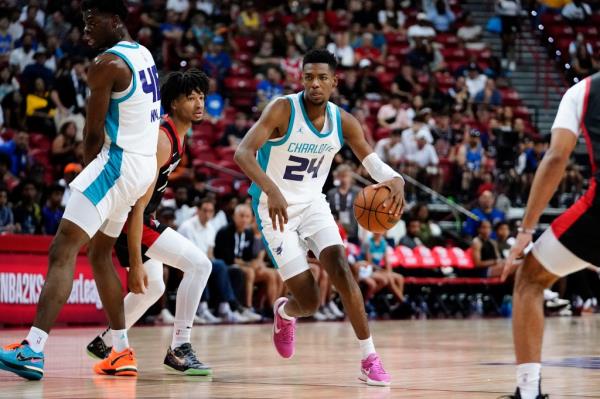 Charlotte Hornets forward Brandon Miller (24) drives the ball against Portland Trail Blazers guard Shaedon Sharpe (17) during the second half at Thomas & Mack Center.