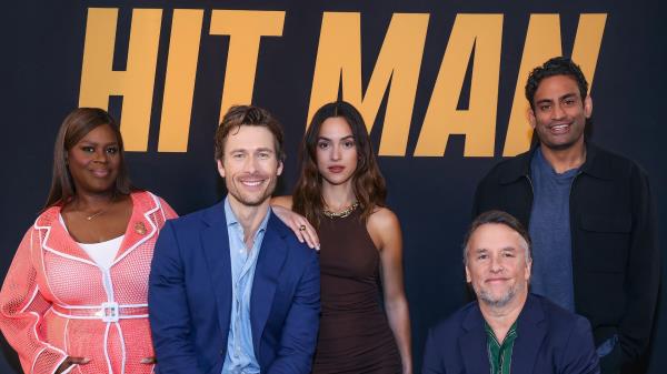 The cast of Hit Man on Netflix with Richard l<em></em>inklater, Retta, Glen Powell, and Adria Arjona