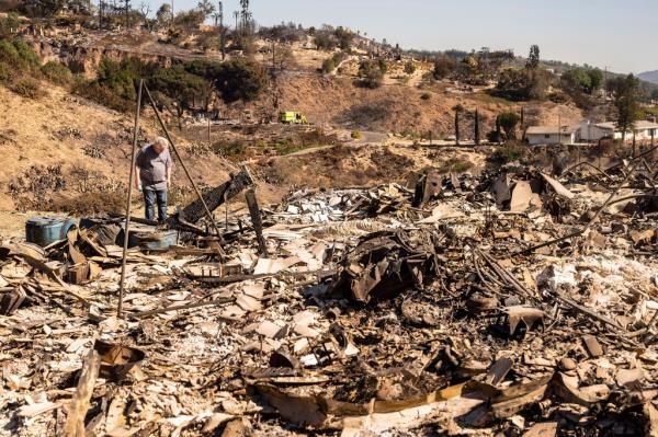 Joey Parish visits his home, Friday, Nov. 8, 2024,  which was destroyed by the Mountain Fire in Camarillo, Calif.