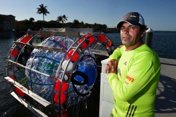 Florida man arrested trying to cross Atlantic to Lo<em></em>ndon in floating human-sized hamster wheel Caption: This April 27, 2016 photo shows Reza Baluchi in Lake Park, Fla. Baluchi washed ashore in Florida Saturday, July 24, 2021 in an apparent attempt to walk on water to New York. The Flagler County Sheriff's Office reported that the man left St. Augustine in the vessel with the goal of reaching New York. (Jim Rassol/South Florida Sun-Sentinel via AP) Photographer: Jim Rassol Provider: AP Source: South Florida Sun-Sentinel Copyright: Sun Sentinel 2016 (Credits: AP)