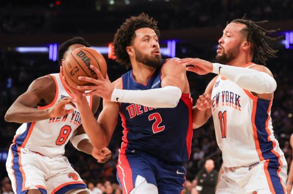 Cade Cunningham, who scored a team-high 29 points, drvies on Jalen Brunson during the Knicks' 120-111 loss to the Pistons on Dec. 7, 2024.