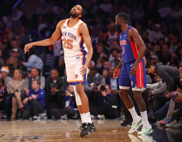 Mikal Bridges wears a dejected ex<em></em>pression as Tim Hardaway Jr. looks on during the Knicks' loss.