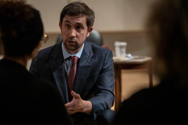 Newly appointed trustee Christopher Rufo talks to faculty and staff on the campus of New College of Florida in Sarasota, Fla. on Wednesday, January 25, 2023.