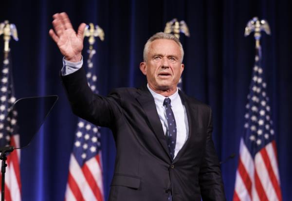 Robert F. Kennedy Jr. waving to a crowd