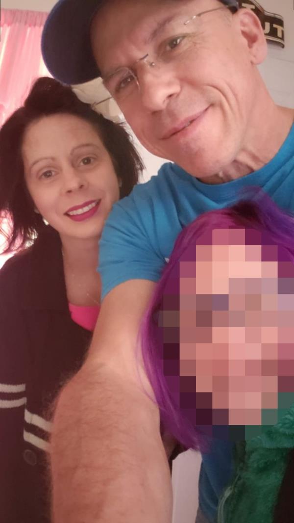 The teen's father, Todd Kolstad, and stepmother, Krista seen with the child's face blurred