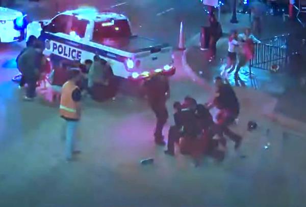 Orlando Police officers tackle the suspected gunman, 17-year-old Jaylen Dwayne Edgar.