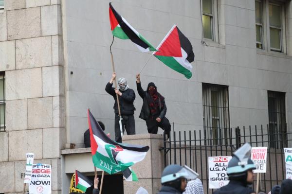 Protesters waving Palestinian flags at Columbia University.