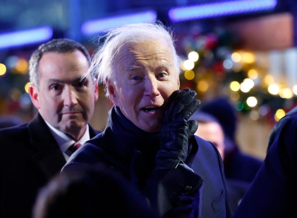 President Joe Biden yells out to the press while departing the 102nd Natio<em></em>nal Christmas Tree Lighting Ceremony on the Ellipse on December 05, 2024 in Washington, DC.