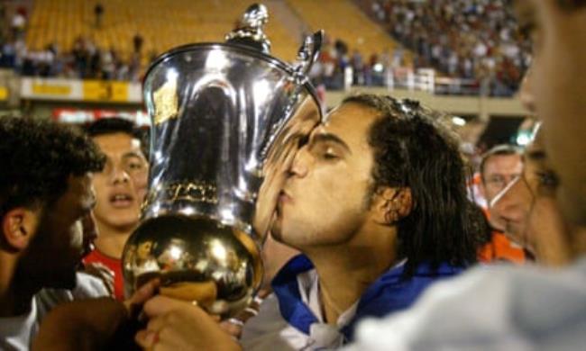 Bnei Sakhnin player Lior Asulin kisses the trophy after the historic State Cup final against Hapoel Haifa in Ramat Gan, Israel, 2004. No Arab team had ever won a major trophy in Israel before