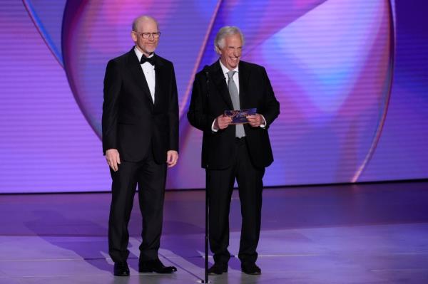 Ron Howard, left, and Henry Winkler present the award for outstanding directing for a comedy series during the 76th Primetime Emmy Awards.