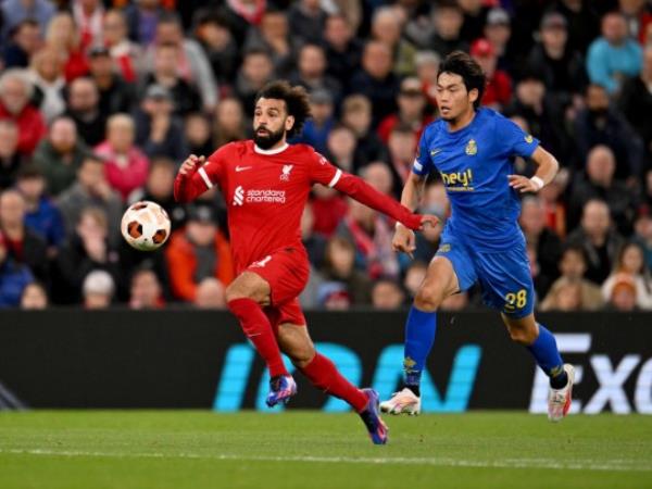 Mohamed Salah playing for Liverpool