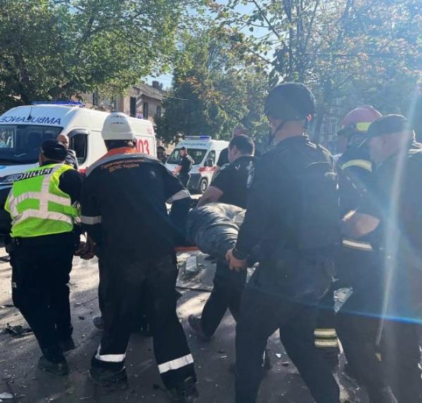 epa10847763 A handout photo made available by Ukraine's Minister of Internal Affairs, Ihor Klymenko, via telegram shows rescuers and police officers evacuating a person from the site of a missile strike in Kryvyi Rih, Dnipropetrovsk region, central Ukraine, 08 September 2023, amid the Russian invasion. A policeman was killed and at least 25 others were injured as a result of a Russian missile strike targeting one of the police administration buildings in Kryvyi Rih on 08 September, Ukraine's Minister of Internal Affairs, Ihor Klymenko wrote on telegram. EPA/UKRAINE'S MINISTRY OF INTERNAL AFFAIRS HANDOUT -- BEST QUALITY AVAILABLE -- MANDATORY CREDIT: IHOR KLYMENKO, UKRAINE'S MINISTER OF INTERNAL AFFAIRS -- HANDOUT EDITORIAL USE ONLY/NO SALES