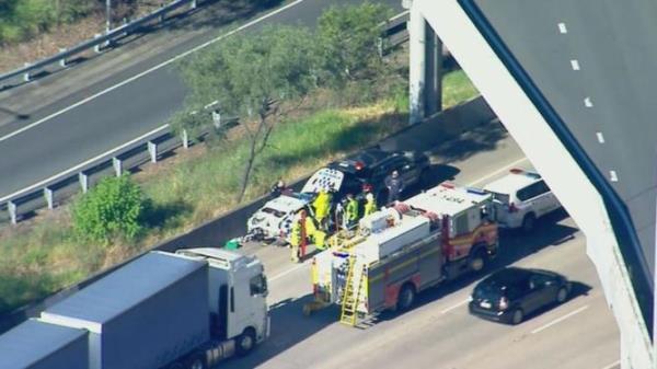 The Forensic Crash Unit is investigating following a serious three-vehicle traffic crash on the Pacific Motorway at Helensvale. Picture: Supplied / 9 News