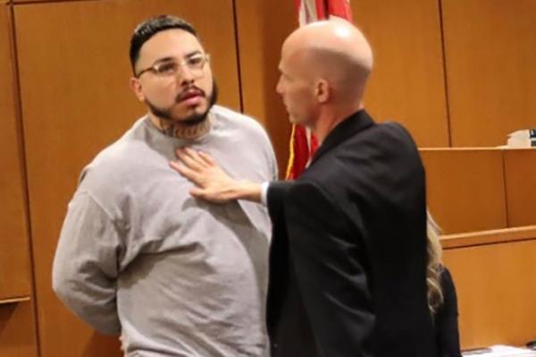 Co<em></em>nvicted murderer, Euren Balbuena, is held back in Ventura County Court after he was attacked by his victim's step father during his sentencing on Wednesday.