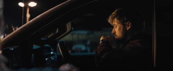 Colt Seavers (Ryan Gosling) quietly weeps while listening to Taylor Swift in the trailer for 