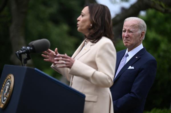 President Joe Biden looks on as US Vice President Kamala Harris delivers remarks during Natio<em></em>nal Small Business Week in the Rose Garden of the White House in Washington, DC, on May 1, 2023