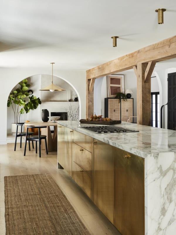 The kitchen has handsome marble counters.