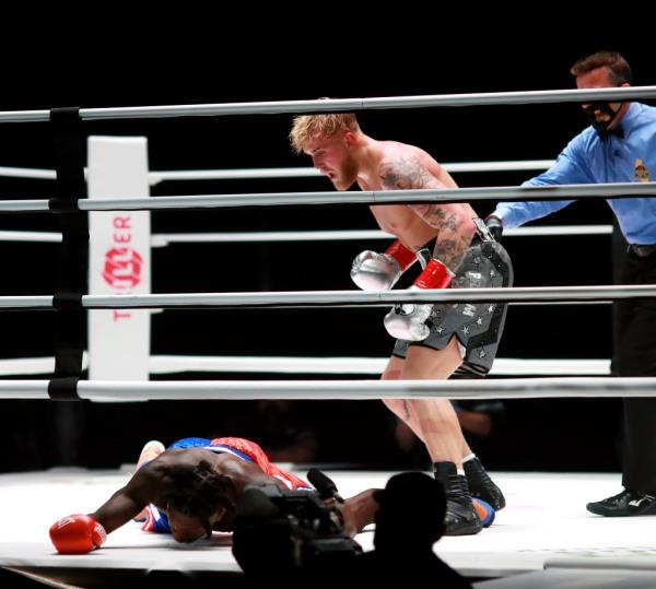 Jake Paul reacts over his knockout victory against Nate Robinson in the second round during Mike Tyson vs Roy Jo<em></em>nes Jr. presented by Triller at Staples Center on November 28, 2020 in Los Angeles, California.  