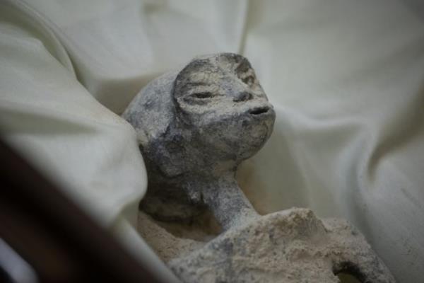 MEXICO CITY, MEXICO - SEPTEMBER 13: One of the two 'non-human' beings displayed to the media is seen during a press co<em></em>nference of Mexican journalist and UFO expert, Jaime Maussan, at the Camino Real hotel, in Mexico City, Mexico on September 13, 2023. The press co<em></em>nference was holding the day after the country's first public co<em></em>ngressional hearing on the topic with UFO experts. The bodies displayed in cases, have three fingers on each hand they were recovered in Peru in 2017, they have no relation to human beings, experts said. (Photo by Daniel Cardenas/Anadolu Agency via Getty Images)