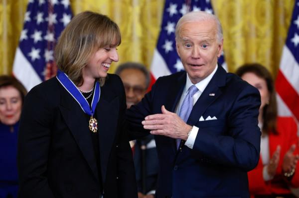 President Joe Biden presents the Presidential Medal of Freedom to Olympic swimmer Katie Ledecky during a ceremony at the White House in Washington, U.S., May 3, 2024.