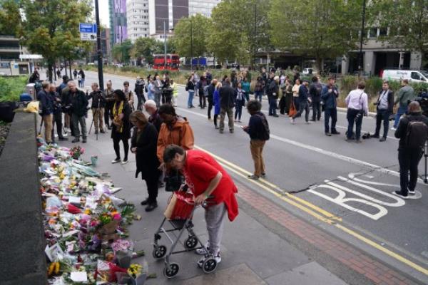 Flowers near the scene in Croydon, south London, wher<em></em>e 15-year-old Elianne Andam was stabbed to death on Wednesday morning. Picture date: Thursday September 28, 2023. PA Photo. A 17-year-old boy, who knew the victim, was arrested just over an hour after the attack which took place on busy Wellesley Road at around 8.30am. See PA story POLICE Croydon. Photo credit should read: James Manning/PA Wire