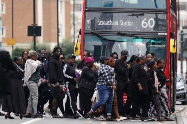 Family and friends of Elianne Andam at the scene in Croydon, south London, wher<em></em>e 15-year-old Elianne was stabbed to death on Wednesday morning. Picture date: Thursday September 28, 2023. PA Photo. A 17-year-old boy, who knew the victim, was arrested just over an hour after the attack which took place on busy Wellesley Road at around 8.30am. See PA story POLICE Croydon. Photo credit should read: James Manning/PA Wire See PA story POLICE Croydon. Photo credit should read: James Manning/PA Wire