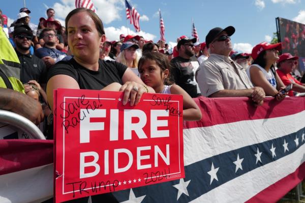 Guests attend a campaign rally hosted by Republican presidential candidate former President Do<em></em>nald Trump at Festival Park on June 18, 2024 in Racine, Wisconsin. 