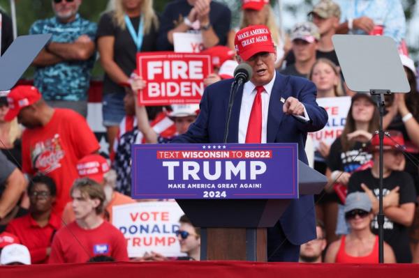 Former U.S. President and Republican presidential candidate Do<em></em>nald Trump speaks during a campaign event, in Racine, Wisconsin, U.S. June 18, 2024.