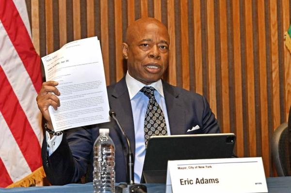 Mayor Adams holding a request from Columbia University asking the NYPD to clear out student protesters from the campus at a press co<em></em>nference on college protMayor Adams holding a request from Columbia University asking the NYPD to clear out student protesters from the campus at a press co<em></em>nference on college protests on May 1, 2024.ests on May 1, 2024.