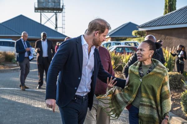 Prince Harry and K.T Mo<em></em>ntshiwa attending a welcome event at Sentebale's Mamohato Children's Centre in Maseru, Lesotho