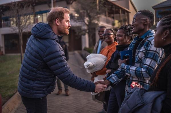 Prince Harry, Duke of Sussex, shaking hands with people at a welcome event at Sentebale’s Mamohato Children’s Centre in Maseru, Lesotho.