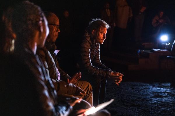 Prince Harry, Duke of Sussex, attending a welcome event at Sentebale’s Mamohato Children’s Centre in Maseru, Lesotho, discussing charity work with South Africa's royals around a campfire.