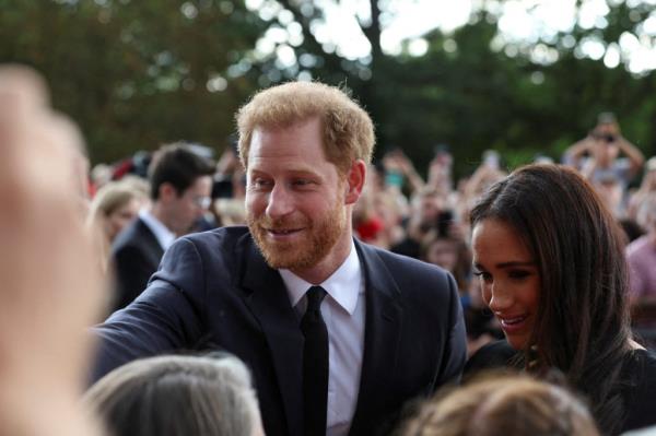 Prince Harry and Meghan, Duchess of Sussex, greeting people outside Windsor Castle after the passing of Queen Elizabeth, Britain, 2022