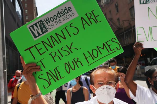 People gather outside of a New York City Marshall's office calling for a stop to evictions on August 31, 2021 in New York City. 