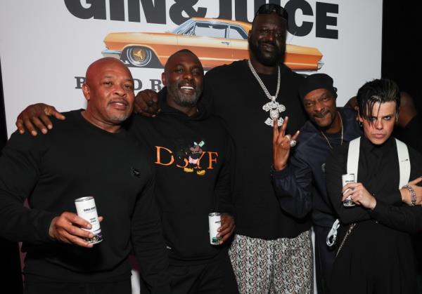 Dr. Dre, Idris Elba, Shaquille O'Neal, Snoop Dogg, and Yung Blud posing backstage at the UK Launch of 'Gin & Juice By Dre and Snoop' at Flipper's Roller Boogie Palace.