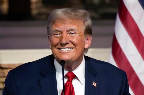 Republican presidential candidate former President Do<em></em>nald Trump smiles at a campaign event at 180 Church, Saturday, June 15, 2024, in Detroit.