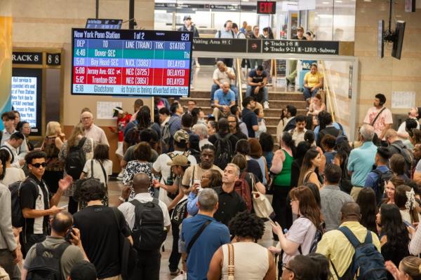 Stranded NJ Transit passengers at Penn Street Station on June 20, 2024, including celebrities Mozart La Para, Xian Hui, and Renato Garcia due to service suspension