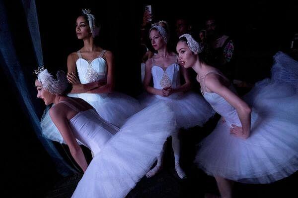 Ballet dancers prepare to perform Swan Lake during the 28th Alicia Alo<em></em>nso Internatio<em></em>nal Ballet Festival of Havana at the Natio<em></em>nal Theatre in Havana, Cuba.