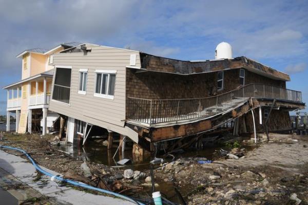 Houses lie in ruins after sustaining tornado and flood damage from Hurricane Milton, Thursday, Oct. 10, 2024, in Matlacha, Fla. (AP Photo/Marta Lavandier)