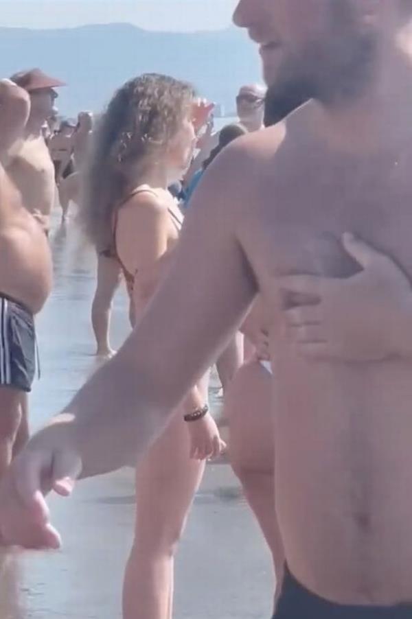 Terrified tourists spot huge shark stalking in shallows at beach in Brit holiday hotspot