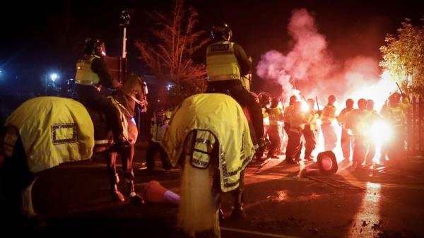 Police clash with Legia Warsaw supporters outside Villa Park before the UEFA Europa Co<em></em>nference League match between Aston Villa and Legia Warsaw