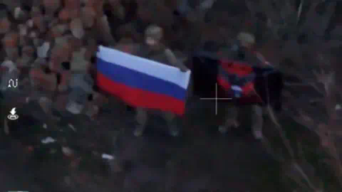 Reuters A soldier holds up a Russian flag in Kurakhove, Do<em></em>netsk Region, Ukraine in this screen grab taken from a social media video released on 5 January